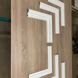 Decorative moulding and architrave detail in Victorian property